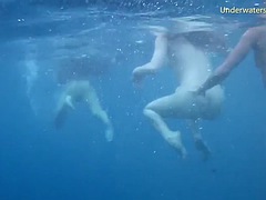 Hot erotica in the sea with 3 girls