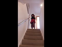 Up and down the stairs in red mini kilt