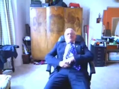 Older men shoot on his suit