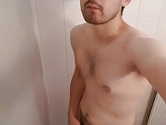 Horny guy rubbing one out in the bathroom, with cumshot