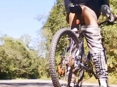 Highly plucky and highly stunning fellow plays with his bicycle in public