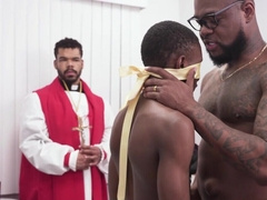 Two priests are watching the banging on the table