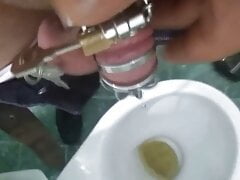 Peeing with chastity