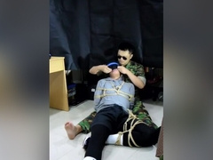 Military man gags boy with his sock