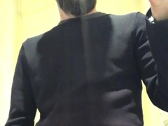 Tugging off in a public restroom