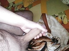 a guy with a nice body jerks off and cums on the bed