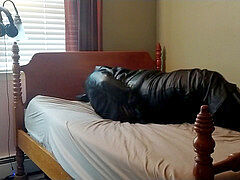 Crossdresser bound, ball-gagged, and fighting