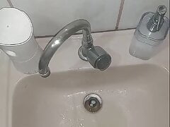 BeardBator pissing in the sink