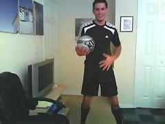 Soccer boy plays with his cock and balls