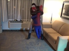 tattooed fishnet wearing guy humps his spiderman dummy