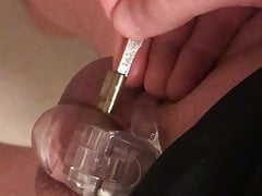 Chastity cage unlocking with time lock