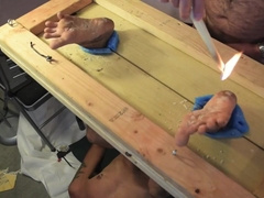 Hot wax dripped on dirty soles in stocks