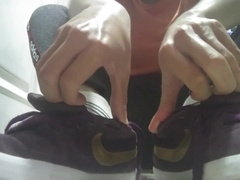 Crimson Nike Sneakers, Socks and nine.five Naked Soles after Running