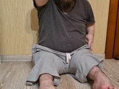 Dwarf undresses, strokes cum through tight foreskin