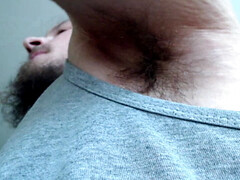 Alpha gives hairy armpit sniff