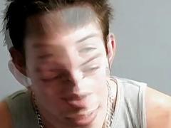 Jock smokes and relaxes while tugging on his big dick