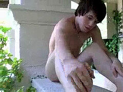 Little twink playing with his big stiffy and spectacular soles