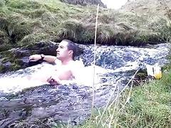 Hot guy spends and hour in a cold Scottish waterfall