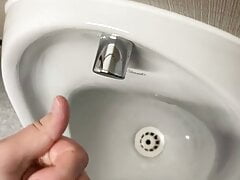 Cruising In the public urinal with big cumshot