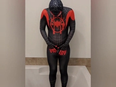 Desperate to urinate, stuck in my Spiderman suit, large pull out at the end
