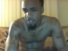 Thug in Milwaukee jerks his dick and plays with his ass on the sofa