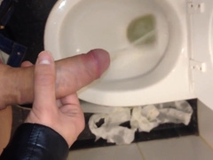Dirty Boy is Playing with penis in public toilet