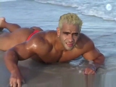 Gay Bodybuilder Joshua Fred! Thong on the beach!