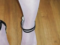 New light pink stockings and black high heels