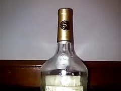 Slut Takes Bottle of Spirits Up Her Pussy