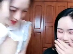 Chinese girls have a nice time eating each others furry pussies
