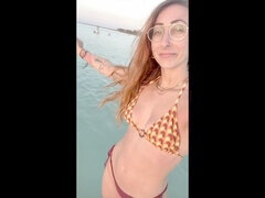 Horny beach babe can't resist playing with her sand-covered pussy in paradise - XXX vlog teaser