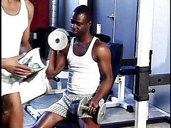 Fit black stud gets his cock sucked at the gym