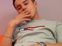 Gay twink smokes solo and tugs on his fat dick