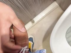 Getting caught playing with my curved dick in a public toilet