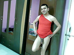 Hot sissy crossdresser in hot red dress shows her booty and cock.