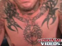 Seductive tattooed hunk jerks off while moaning in hot solo
