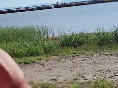 Johnholmesjunior showing off his monster big dick on public vancouver nude beach