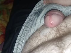 chubby guy jerks off cock through pants and cums