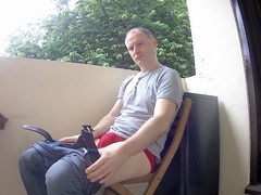 Kudoslong strips down and strokes his cock on the balcony