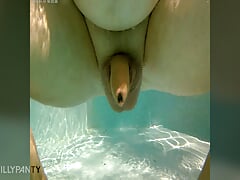 In the pool with my cock out and getting blown by the jets