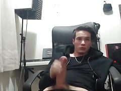 big dick lad wanks in his chair