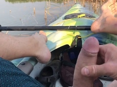Exciting kayak adventure leads to risky solo pleasure and explosive climax in the middle of the lake