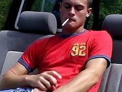 Naughty twinks smoking outdoors and jerking off on a truck