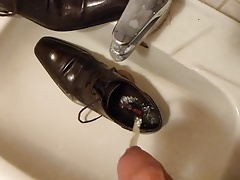 Piss in men's dress shoe