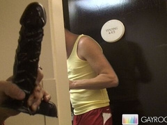 Surprise dildo shenanigans in a fancy hotel hallway