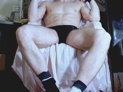 Muscular man savors big twink cock until it cums