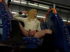 Crossdresser cums on bus