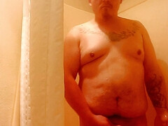 Jerking thick cock in shower homemade