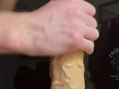 Taking a meaty faux-cock nine inches around