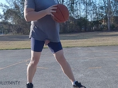 Exhibitionist guy shows off his basketball skills while stroking his hard cock on a public court